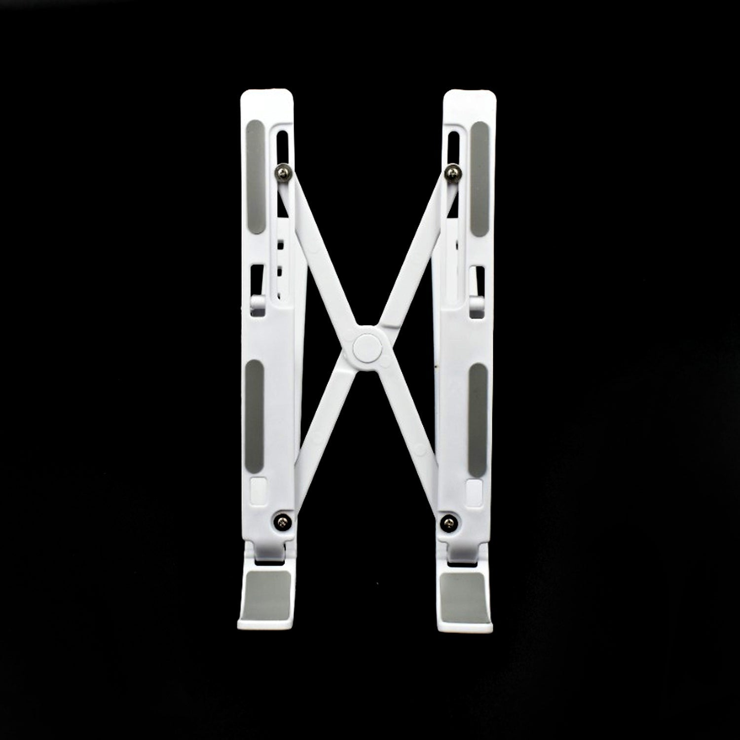 Ergonomic laptop stand on a work desk Ergonomic laptop stand on a work desk